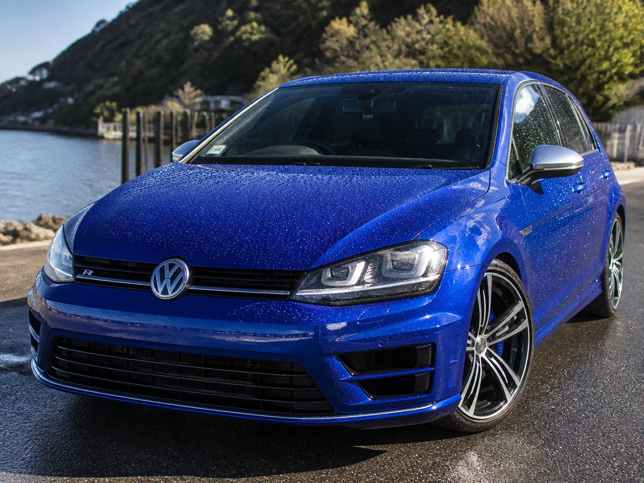 Blue Volkswagen Golf R with hydrophobic water beading on the paint